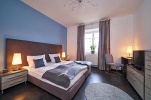 Postel nebo postele na pokoji v ubytování Hotel am Hof