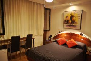 Postel nebo postele na pokoji v ubytování Sur Hotel