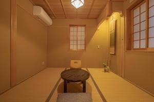 Posezení v ubytování Saju Kyoto 茶住 京都