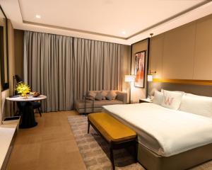 Postel nebo postele na pokoji v ubytování Welcomhotel by ITC Hotels, Dwarka, New Delhi