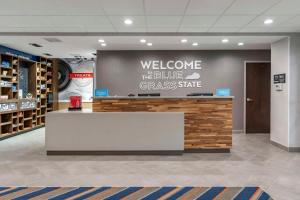 a welcome to the bluegrass state sign in a store lobby at Hampton Inn Nicholasville Brannon Crossing, Ky in Nicholasville