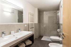 Koupelna v ubytování Residence Haus Heinrich + 29 fotografií