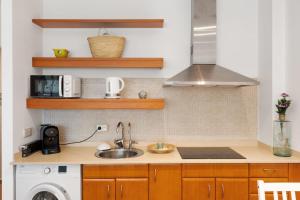 Kjøkken eller kjøkkenkrok på Hauzify I Apartament Can Bou
