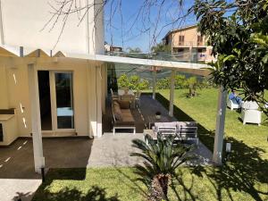 a view of a house with a patio at Villa Oasi Verde in Cinisi