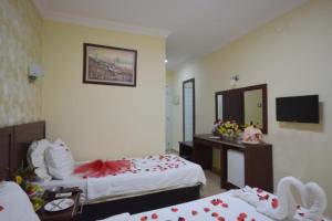Cama o camas de una habitación en ADMİRAL HOTEL