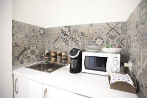 Köök või kööginurk majutusasutuses Dorant Charme&Rooms