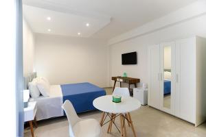 Voodi või voodid majutusasutuse Dorant Charme&Rooms toas