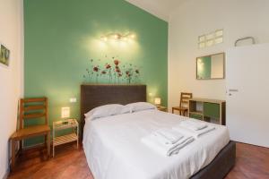 Llit o llits en una habitació de Gaddi by Mmega
