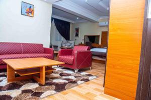 A seating area at Otk's Apartment