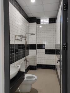 Koupelna v ubytování NEW WAVE HOMESTAY