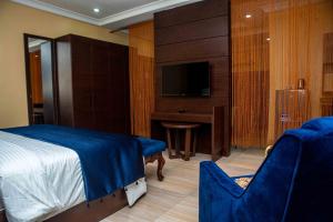 A television and/or entertainment centre at Otk's Apartment