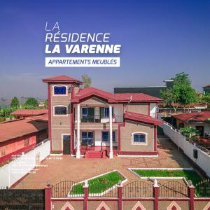 a house with a sign that reads a residence la variance at RESIDENCE LA VARENNE, DSCHANG in Dschang