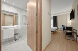 Koupelna v ubytování Hotel Zentral Gijón Rey Pelayo