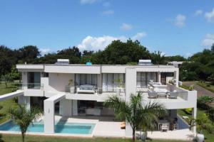 an aerial view of a house with a swimming pool at The Four Palms in Kilifi