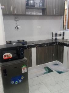 a kitchen being remodeled with a counter top at Stylish villa homes in Mombasa