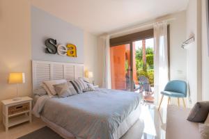 Posteľ alebo postele v izbe v ubytovaní Sailor House con piscina en la nueva Milla de Oro