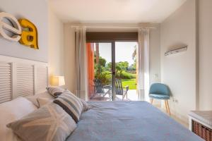 Posteľ alebo postele v izbe v ubytovaní Sailor House con piscina en la nueva Milla de Oro