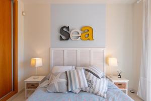 Posteľ alebo postele v izbe v ubytovaní Sailor House con piscina en la nueva Milla de Oro