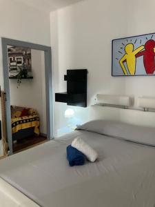 a bedroom with a large white bed in a room at Town Center Lugano in Lugano