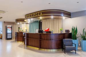a lobby of a hotel with a reception desk at Hotel Tarnovia in Tarnów
