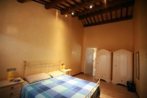 A bed or beds in a room at B&B Contarine