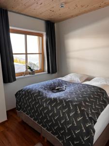 Katil atau katil-katil dalam bilik di GLOCKNERALM - HIKING- and SKIHOTEL exklusively accessible by cable car