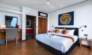 Postel nebo postele na pokoji v ubytování Villas Del Sol Koh Tao + 21 fotografií