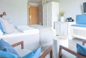 TV a/nebo společenská místnost v ubytování Hotel Am Medemufer