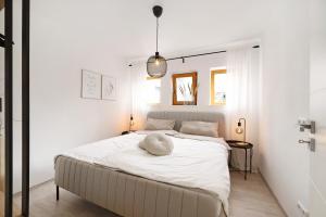 Ένα ή περισσότερα κρεβάτια σε δωμάτιο στο Casa Schneck