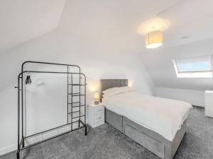 Ένα ή περισσότερα κρεβάτια σε δωμάτιο στο Seaside Escape