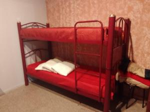 a couple of bunk beds in a room at Cabañas Alicia in San Rafael