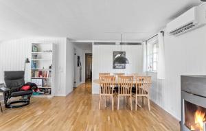 a kitchen and dining room with a table and chairs at 3 Bedroom Beautiful Home In Vordingborg in Vordingborg