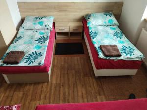 Posteľ alebo postele v izbe v ubytovaní Apartmán se dvěma ložnicemi