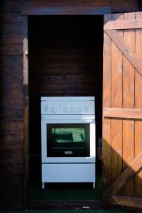 a white oven inside of a wooden building at La Cupola dei Trabocchi in Torino di Sangro