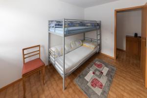 Postel nebo postele na pokoji v ubytování casa Pagnoncini