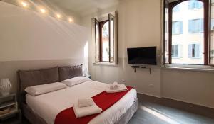 Posteľ alebo postele v izbe v ubytovaní SAHI - Residenza Bianca di Savoia