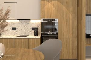 a kitchen with a table and a stove top oven at Old town luxury apartment 2 in Kos
