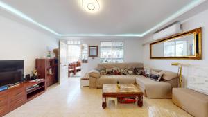 Et tv og/eller underholdning på Gran Alacant bungalow vistas al mar