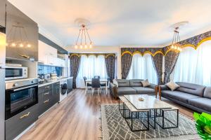 a living room with a couch and a table at Sisli Form Hotel in Istanbul