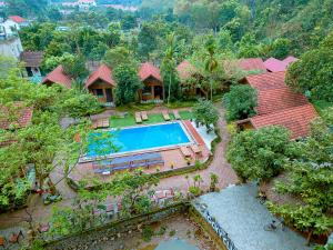 an aerial view of a house with a swimming pool at Tam Coc Rocky Bungalow in Ninh Binh