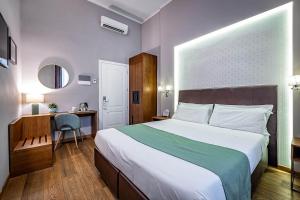 Posteľ alebo postele v izbe v ubytovaní Antico Centro Suite