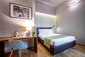 Posteľ alebo postele v izbe v ubytovaní Antico Centro Suite