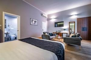 Posteľ alebo postele v izbe v ubytovaní Antico Centro Suite