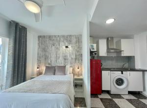 Posteľ alebo postele v izbe v ubytovaní LaFrenchTouch - Coqueto estudio terraza con vistas + 7 fotografií