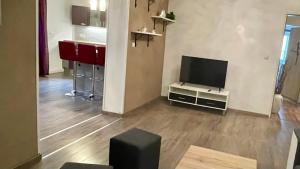 TV a/nebo společenská místnost v ubytování Haus am Soleweg