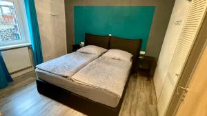 Postel nebo postele na pokoji v ubytování Haus am Soleweg