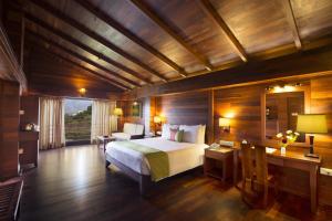 Cama o camas de una habitación en GReaT trails Kodaikanal by GRT Hotels