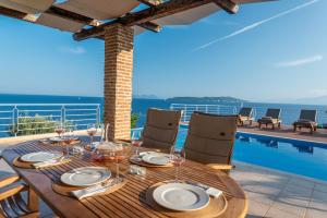 The swimming pool at or close to Iris Villas Lefkada - Karavi Villa with private sea access