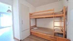 Postel nebo postele na pokoji v ubytování Vallee Blanche - E2 - Studio confort - 4 pers