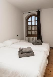 Voodi või voodid majutusasutuse Al Borgo toas